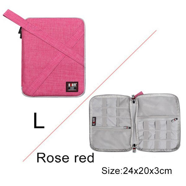 Large rose red (pink) Cable Organiser bag for travel. it is rectangular with a zipper. it has a pouch opened up showing where the cable are organised , there is a pocket for phones or plugs and 3 other organiser bands.