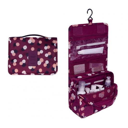Burgundy coloured hanging toiletry bag. with a flowery pattern of white pink and dark burgundy coloured flowers. Great for travel with a large pouch with zipper, a net mesh with zipper and a clear transparent pouch with zipper, with a hook above it tp all folds into a compact bag with carry handle. hang on doors or shelving. All folds up into a neat bag with carry handle.