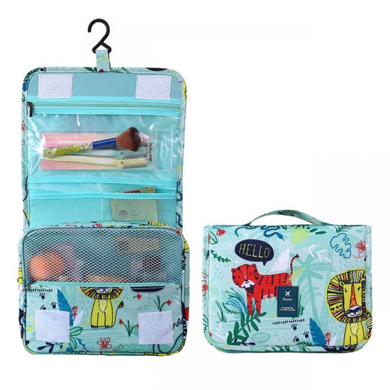 Jungle animal themed Childrens hanging toiletry bag. The pattern is leaves, tiger and lion. Great for travel with a large pouch with zipper, a net mesh with zipper and a clear transparent pouch with zipper, with a hook above it tp all folds into a compact bag with carry handle. hang on doors or shelving. All folds up into a neat bag with carry handle.