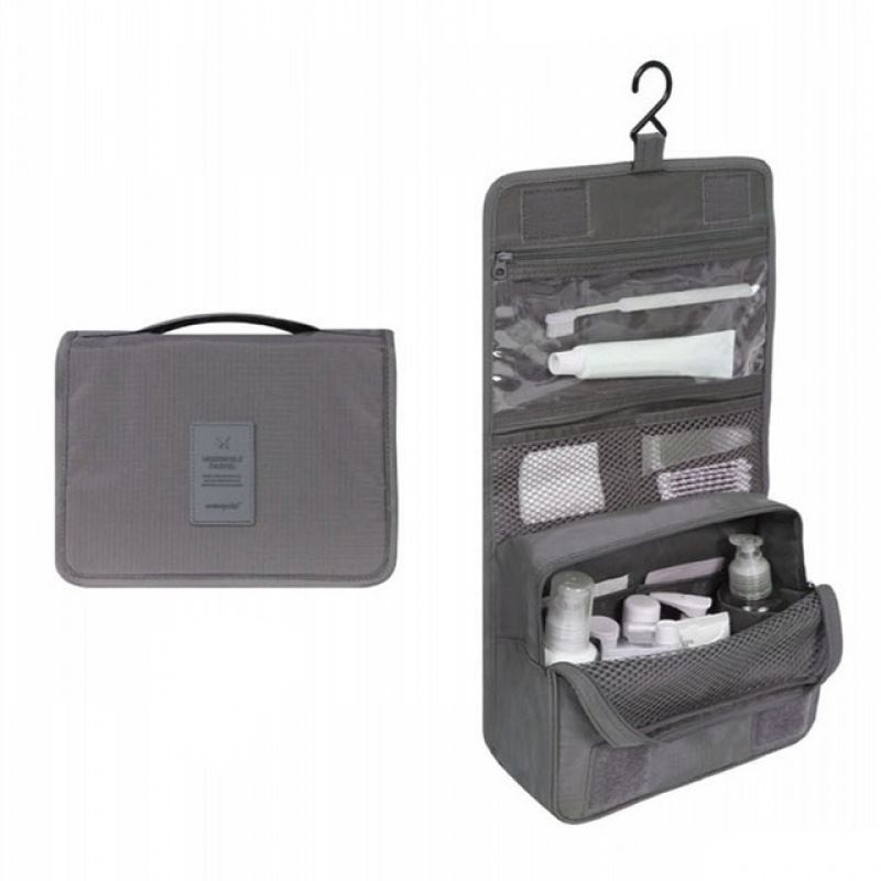 Solid Grey coloured hanging toiletry bag. Great for travel with a large pouch with zipper, a net mesh with zipper and a clear transparent pouch with zipper, with a hook above it tp all folds into a compact bag with carry handle. hang on doors or shelving. All folds up into a neat bag with carry handle.