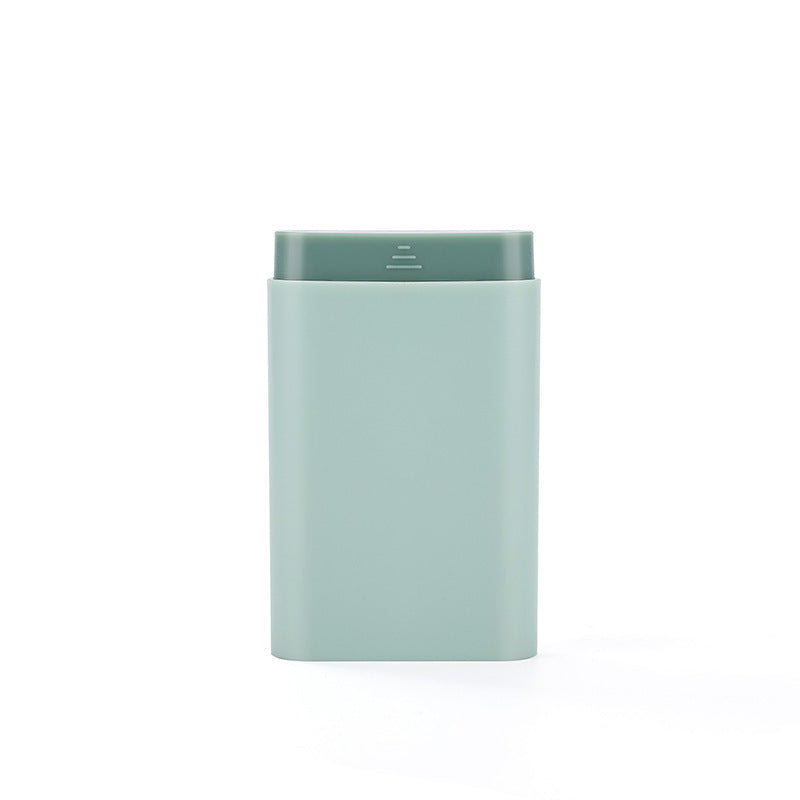 Green with contrasting colour tray travel medication case