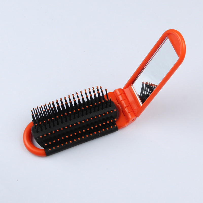 Portable Folding Hair Brush With Mirror For Detangling Your Flight or Roller Coaster Hair