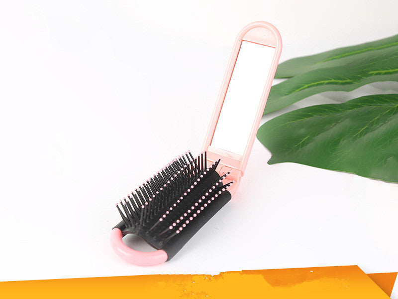 Portable Folding Hair Brush With Mirror For Detangling Your Flight or Roller Coaster Hair