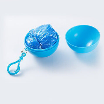 this shows the blue ball open revealing the folded disposable poncho inside. this ball has a blue bag clip