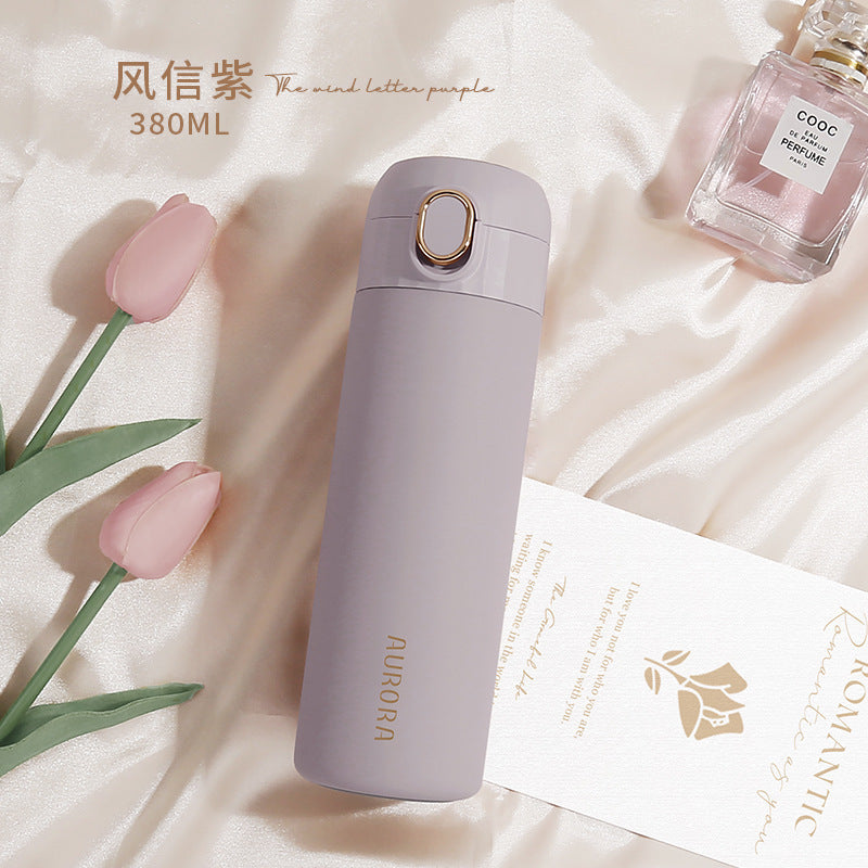 This is the hyacinth purple Aurora Bottle with gold edged flip button and gold Aurora Lettering