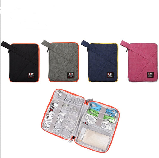 4 Cable Organisers for travel. all rectangular in shape. the colours are black with an orange sip. Grey with an orange zip. Blue with a yellow zip and rose red pink with a grey zip.