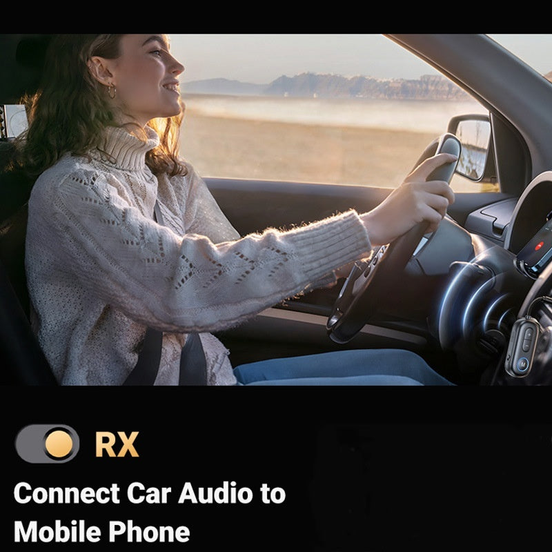 woman in her car driving and has the adapter plugged into the car sound system talking to someone on the phone.