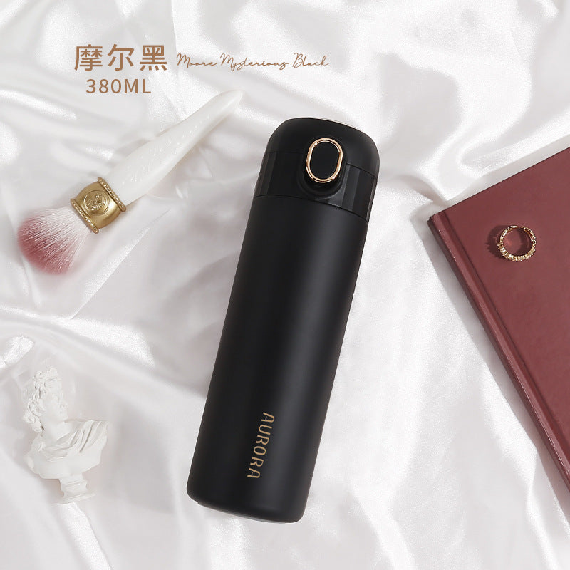 This is the Moer Black Aurora Bottle with gold edged flip button and gold Aurora Lettering