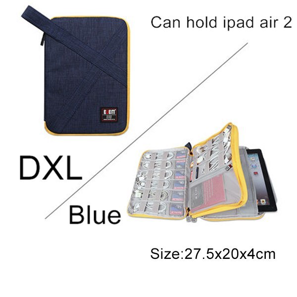 DXL Blue Cable Organiser bag for travel. it is rectangular with a yellow zipper. it has multiple bands for cables on 2 sides and there is an extra pouch with pockets that fits phones or tablet.