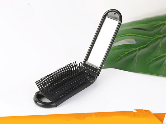 Portable Folding Hair Brush With Mirror For Detangling Your Flight or Roller Coaster Hair