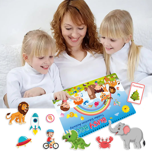 This image shows a mum and 2 daughters looking through the busy book and pointing at activities.