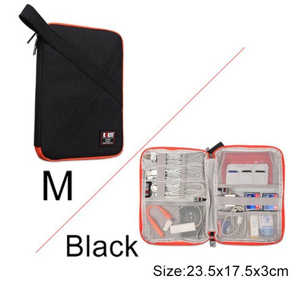 Medium Black Cable Organiser bag for travel. it is rectangular with an orange zipper. it has a pouch opened up showing where the cables are organised , there is a pocket with a zip for phones or plugs and other organiser bands and a power bank pocket.