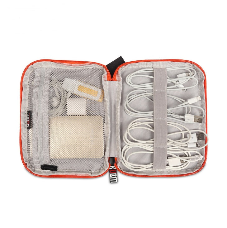 An open cable and electronics organiser pouch or bag, showing the cable tidy bands and where to store them and a mesh zippered poket on the other side ofr a power bank and earphones.