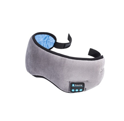 Gray sleep mask and Bluetooth control panel on a white background