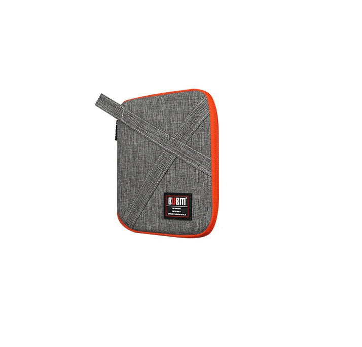 Small gray Cable Organiser bag for travel. it is rectangular with a orange zipper.