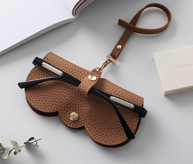 Brown Clip on Sunglasses holder. A great travel glasses case.