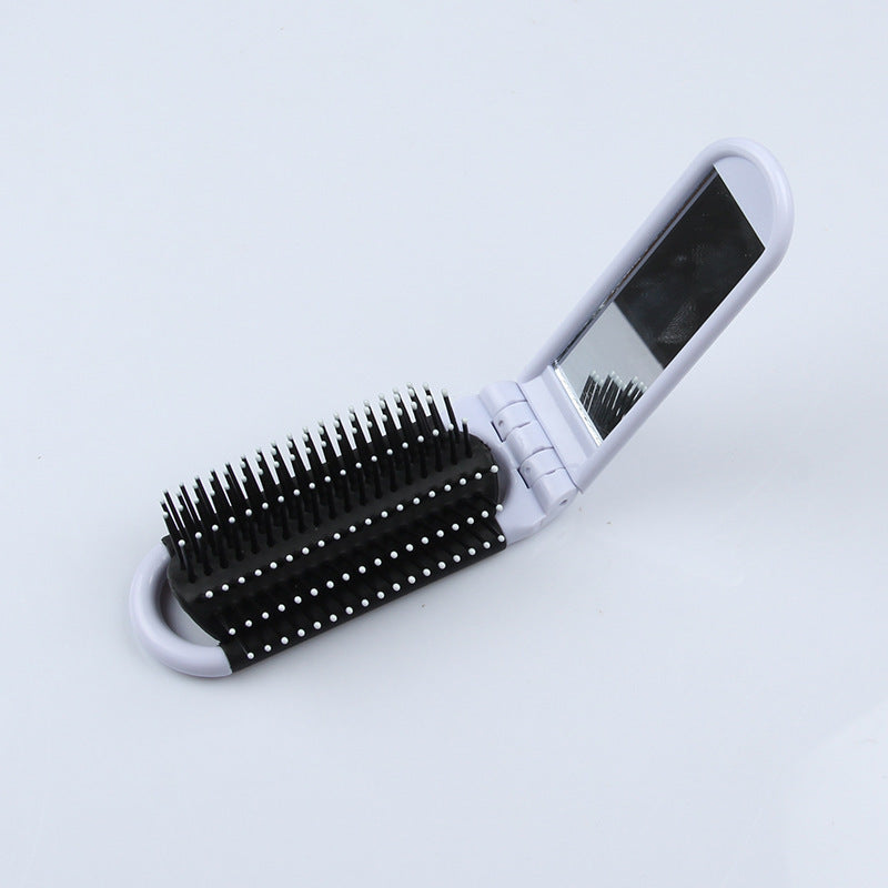 Portable Folding Hair Brush With Mirror For Detangling Your Flight or Roller Coaster Hair