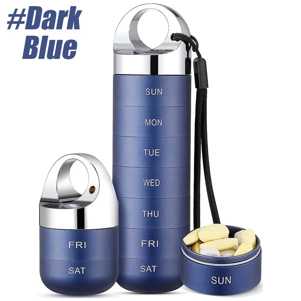 Navy Blue pill organizer with compartments for weekdays and a small container with pills on a white background.
