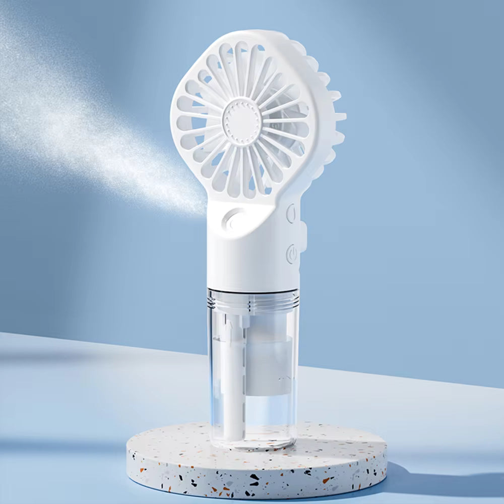 White Handheld fan with mist spray on a light blue background