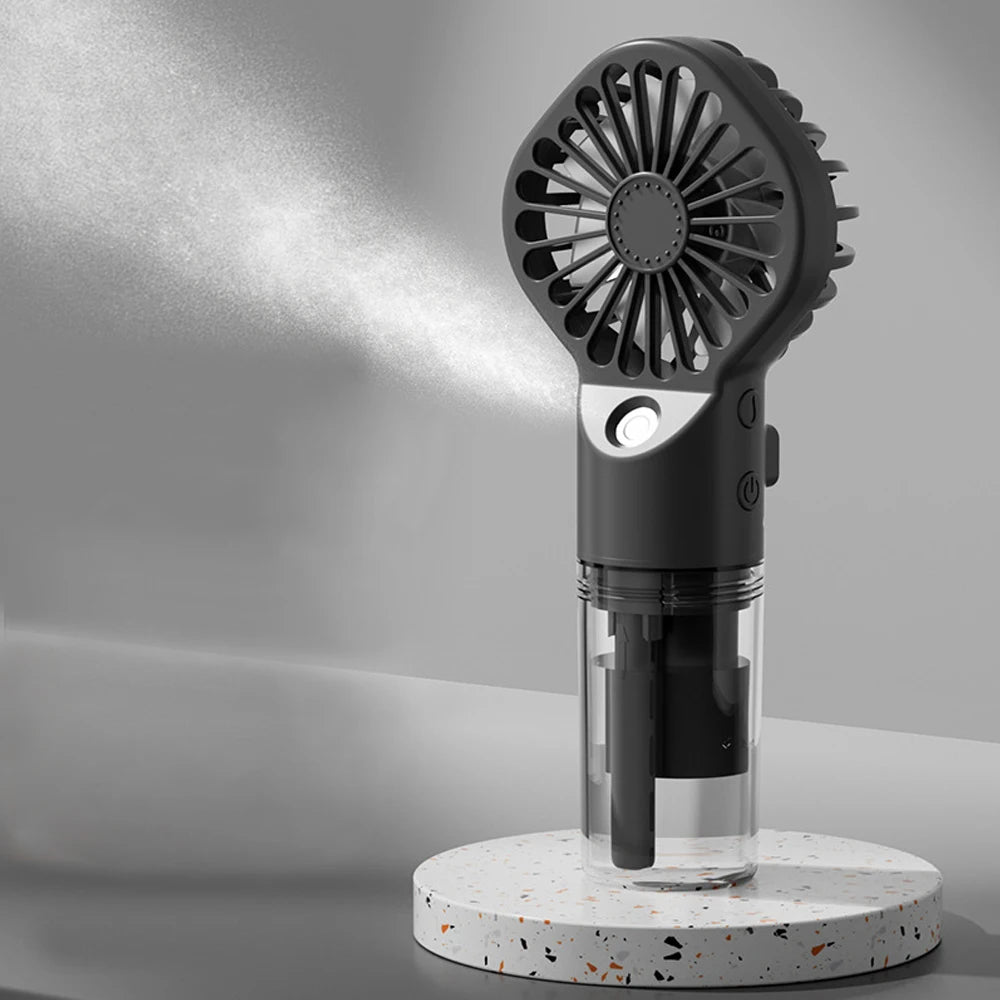 Handheld black fan on a gray background