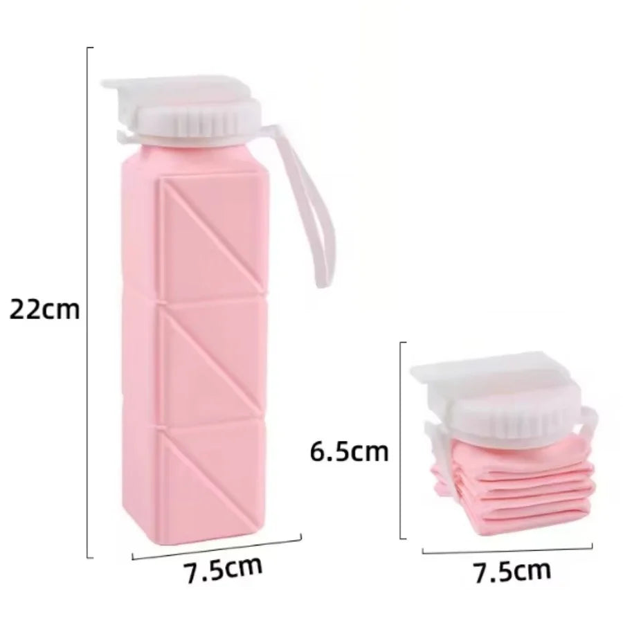 Collapsible pink water bottle with measurements on a white background