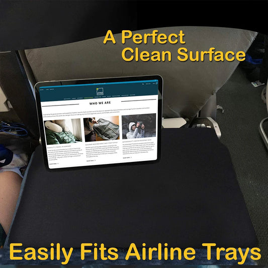 Tablet on a clean surface with text highlighting its compatibility with airline trays.
