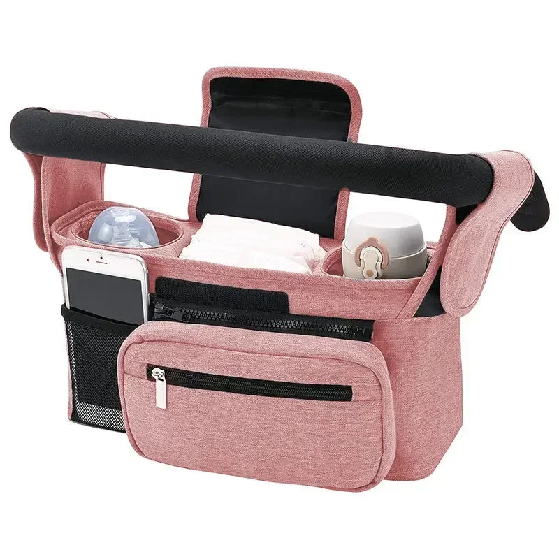 shows pink bag hanging from stroller