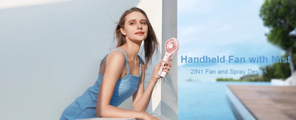Woman holding a handheld fan with mist near a poolside