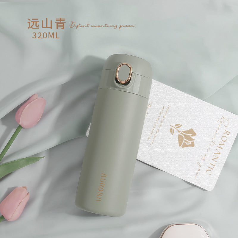 This is the Yuanshan Green Aurora Bottle with gold edged flip button and gold Aurora Lettering