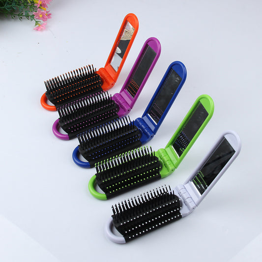 Portable Folding Hair Brush With Mirror For Detangling Your Flight or Roller Coaster Hair