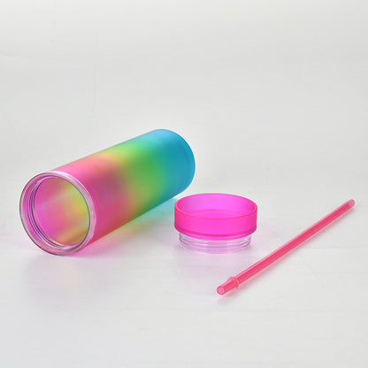 this image shows the pink cup on its side and you can see the inside of the cup, the lids unscrewed and the straw is next to the cup. All made with BPA free plastics