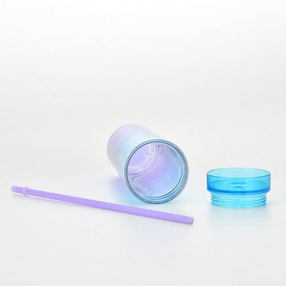 this image shows the blue cup on its side and you can see the inside of the cup, the lids unscrewed and the straw is next to the cup. All made with BPA free plastics