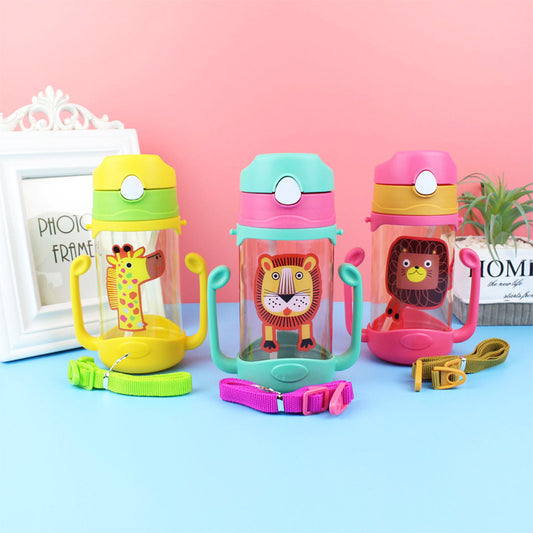 Three colorful children's water bottles with animal designs on a pink and blue gradient background.