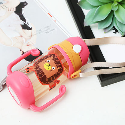 Pink and beige children's water bottle with lion design on a white surface