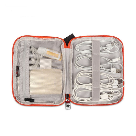 An open cable and electronics organiser pouch or bag, showing the cable tidy bands and where to store them and a mesh zippered poket on the other side ofr a power bank and earphones.