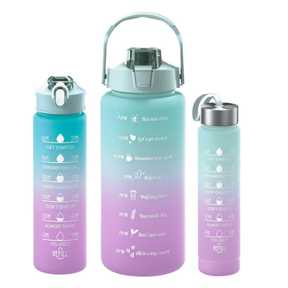 3-piece gradient Sports Cup Set in green,the gradient colours are pastels from the bottom up are purple to blue to green. with built in straw and 3 different sizes, 2 litres, 800ml and 300ml. They have a drinking time line on the bottles in gold. the smallest bottle has a screw on lid with a fabric handle. The larger bottles have the locking straw screw on lid and the large 2 litre bottle has a carrying handle.