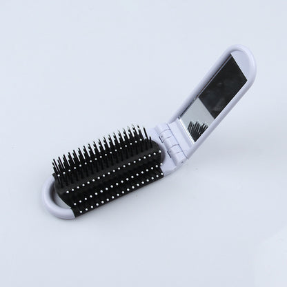 Portable Folding Hair Brush With Mirror For Detangling Your Flight or Roller Coaster Hair