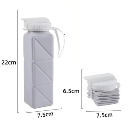 Gray collapsible water bottle with measurements on a white background