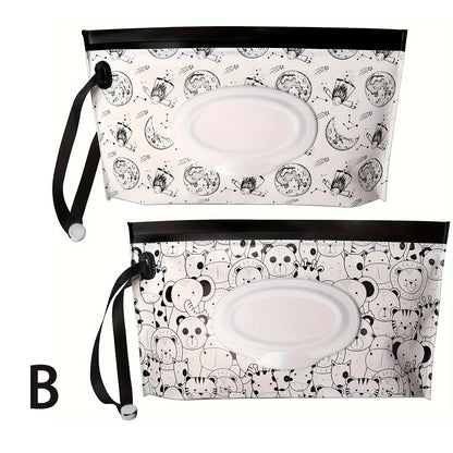 2 pc black & White set B are stars and moon design on one and animals on the other tissue holder