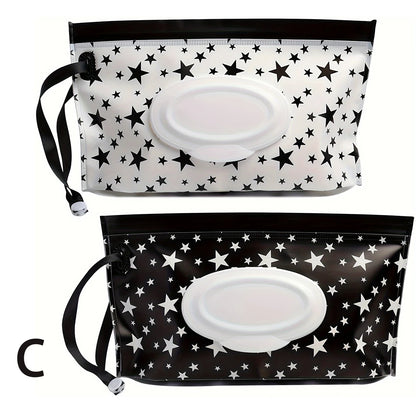 2 piece black & White tissue and wipes holder. one is black with white stars the other is white with black stars.