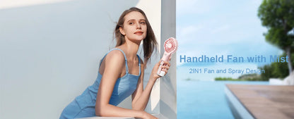 Woman holding a handheld fan with mist near a poolside
