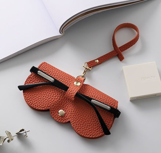 Orange Clip on Sunglasses holder. A great travel glasses case.