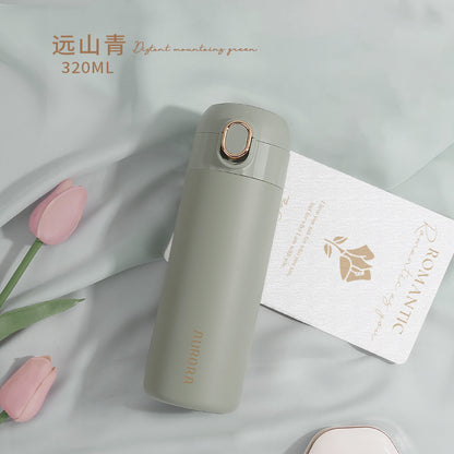This is the Yuanshan Green Aurora Bottle with gold edged flip button and gold Aurora Lettering